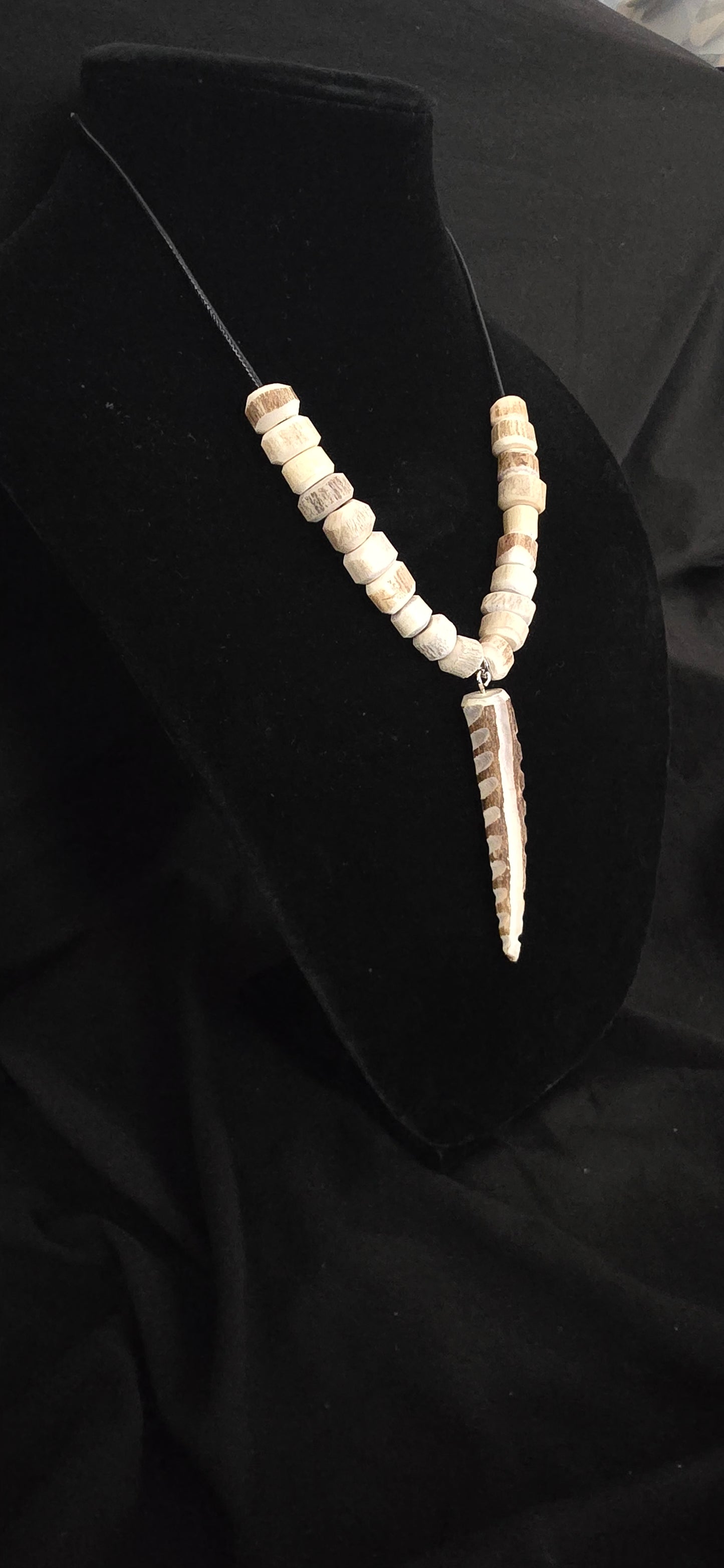 Antler necklace with decorated tip