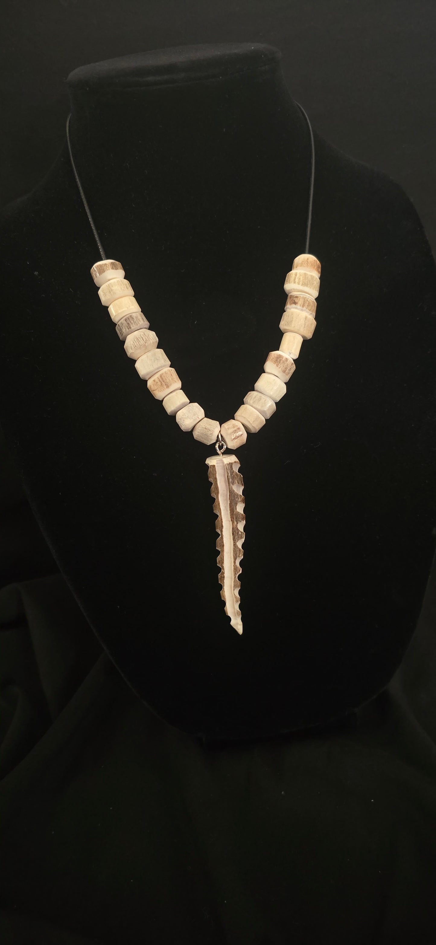 Antler necklace with decorated tip